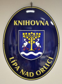 Enamel oval sign with a coat of arms, the name of a village/town/township and the name of an institution