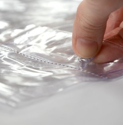 Raincover for an embroidered banner or flag