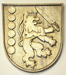 Wood carved coat of arms of Držkov