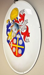 An example of a rendition of a personal heraldic achievement on an enamel oval sign