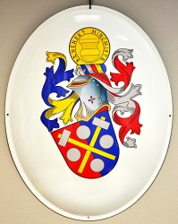 An example of a rendition of a personal heraldic achievement on an enamel oval sign