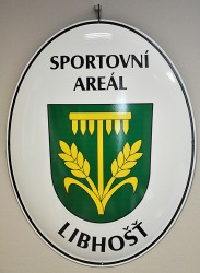 Enamel oval welcome sign designating an entrance of an area