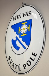 Enamel welcome sign with a coat of arms and a name of a village/town/township