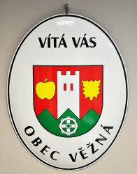 White enamel welcome sign for the municipality of Věžná